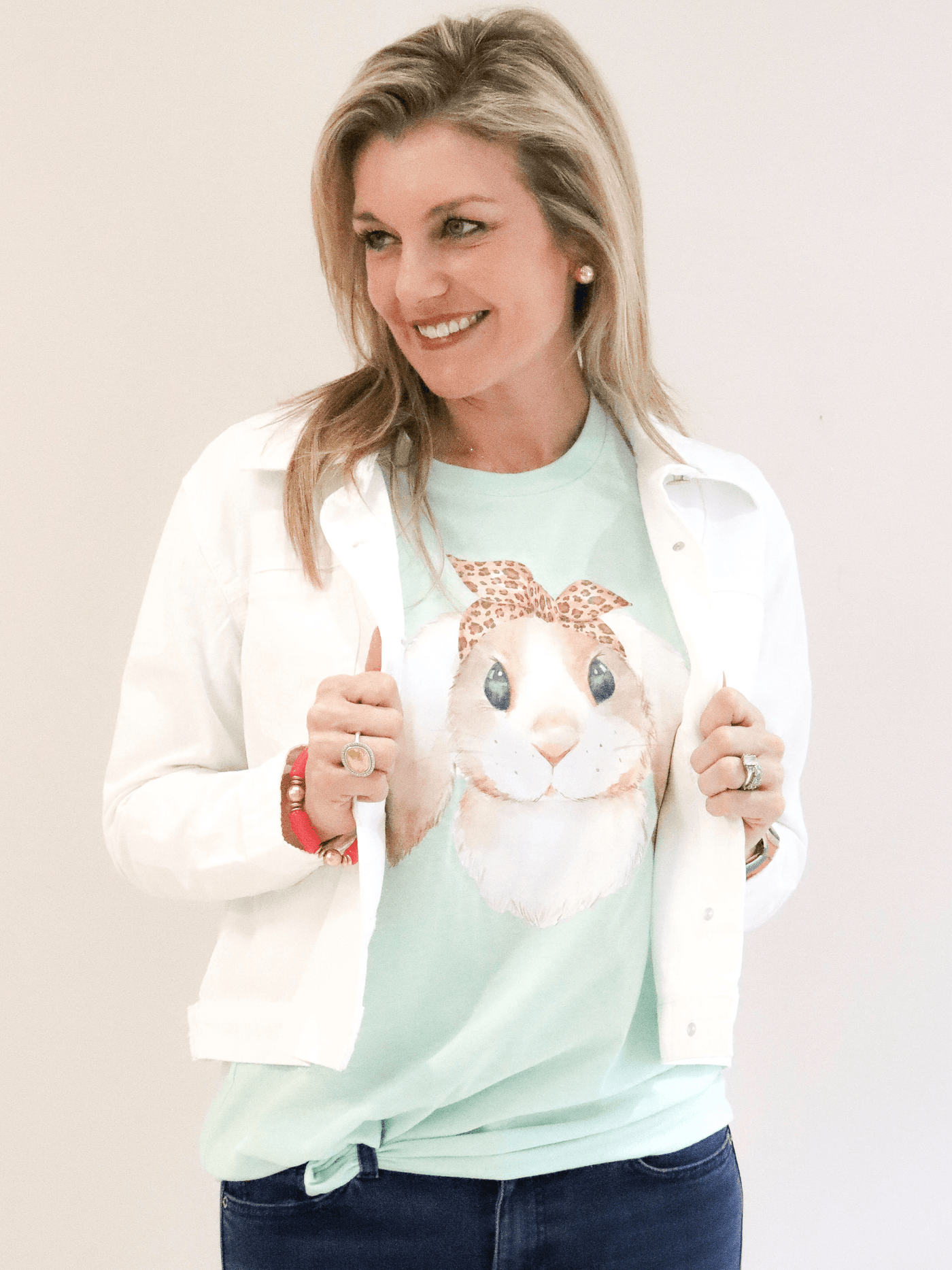 Floppy Bunny Tee front view with white jacket.