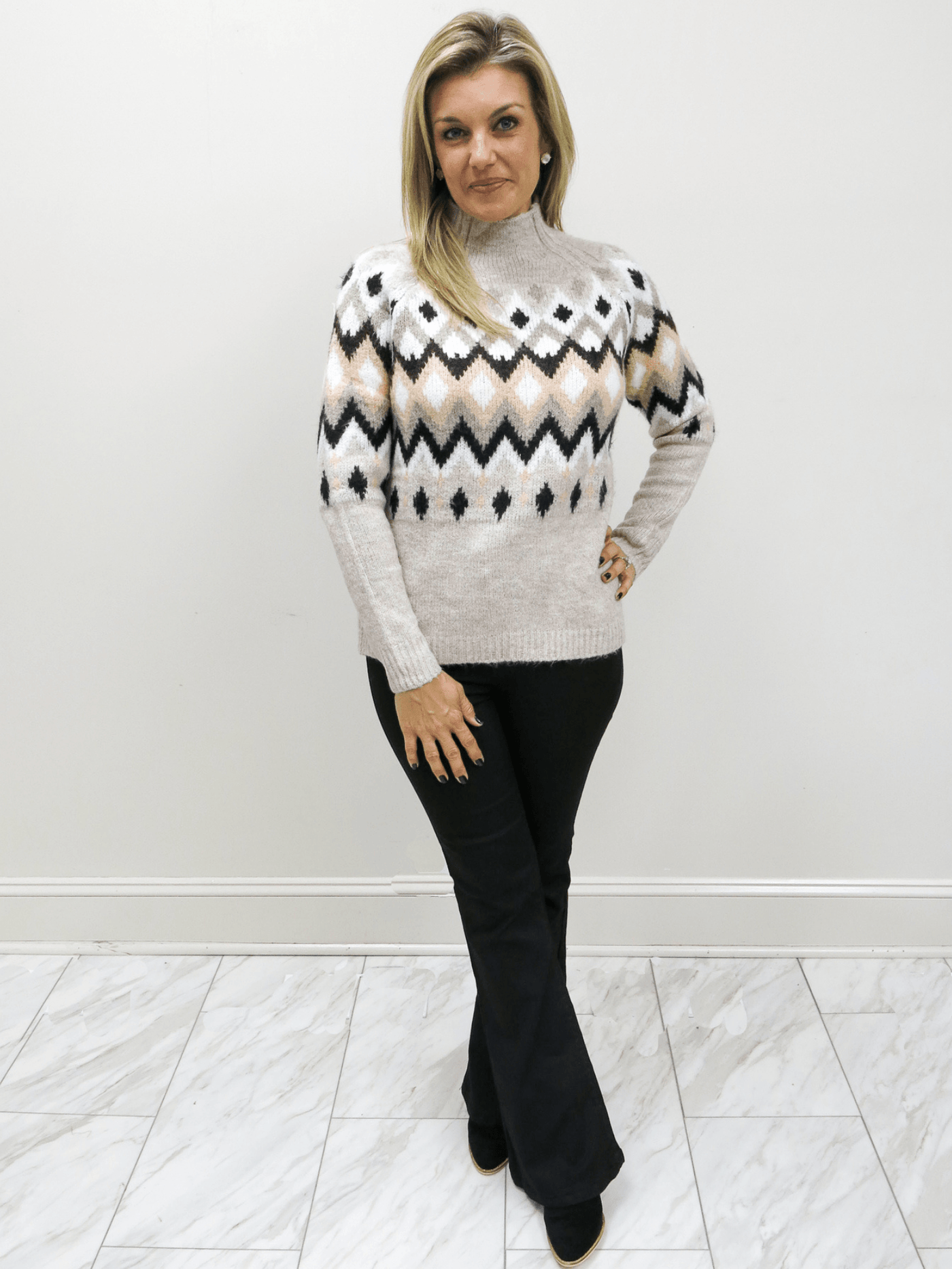 Risen coated black flare jeans with fair isle sweater full front view.