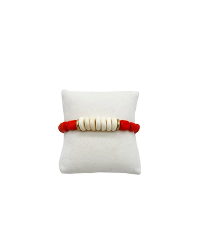 coral short tube, flat gold, and flat round bone white bead stretch bracelet