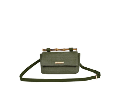 Hunter green woven handbag with a bamboo handle and a shoulder strap