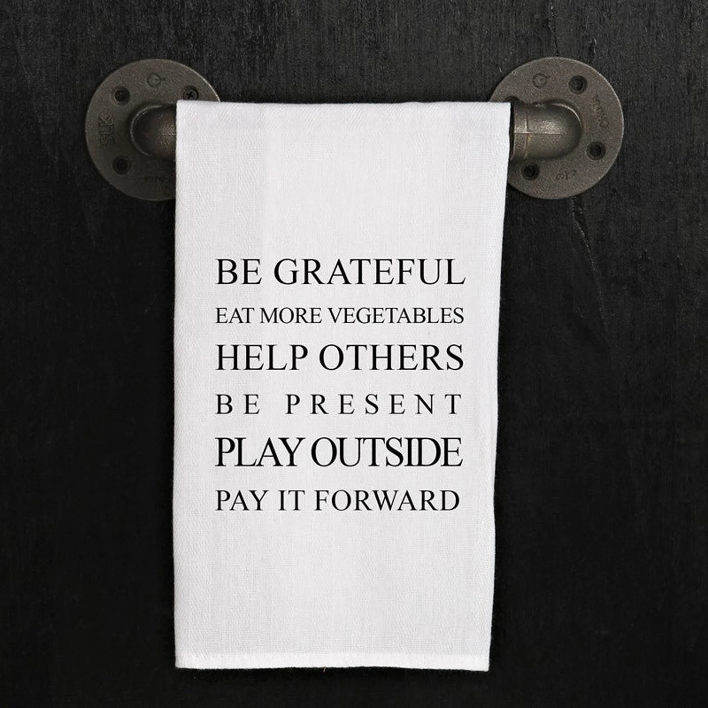 "Be grateful, eat more vegetables, help others, be present, play outside, pay it forward" text written on front of white tea towel.