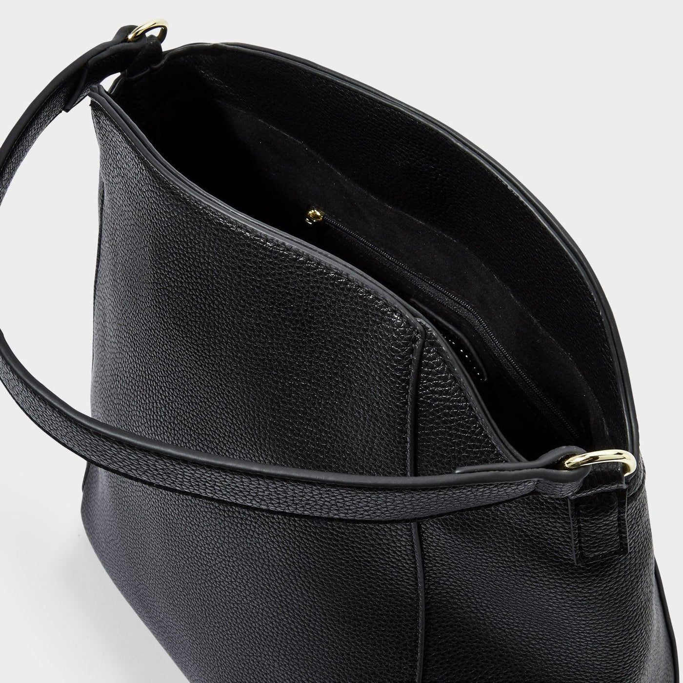 Inside look at the black fold top handbag