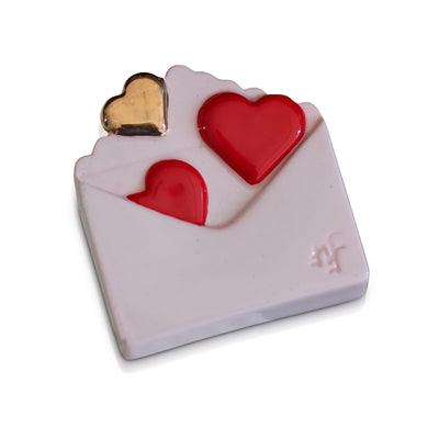 Pink envelope with red and gold hearts