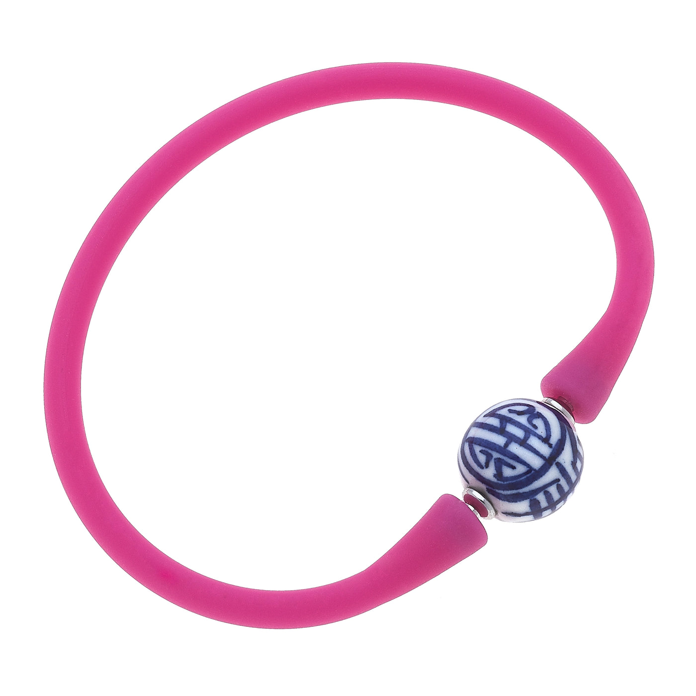 Magenta silicone bracelet with a small chinoiserie bead