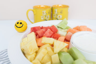 Chip and dip plate with fruit and smiley face mini