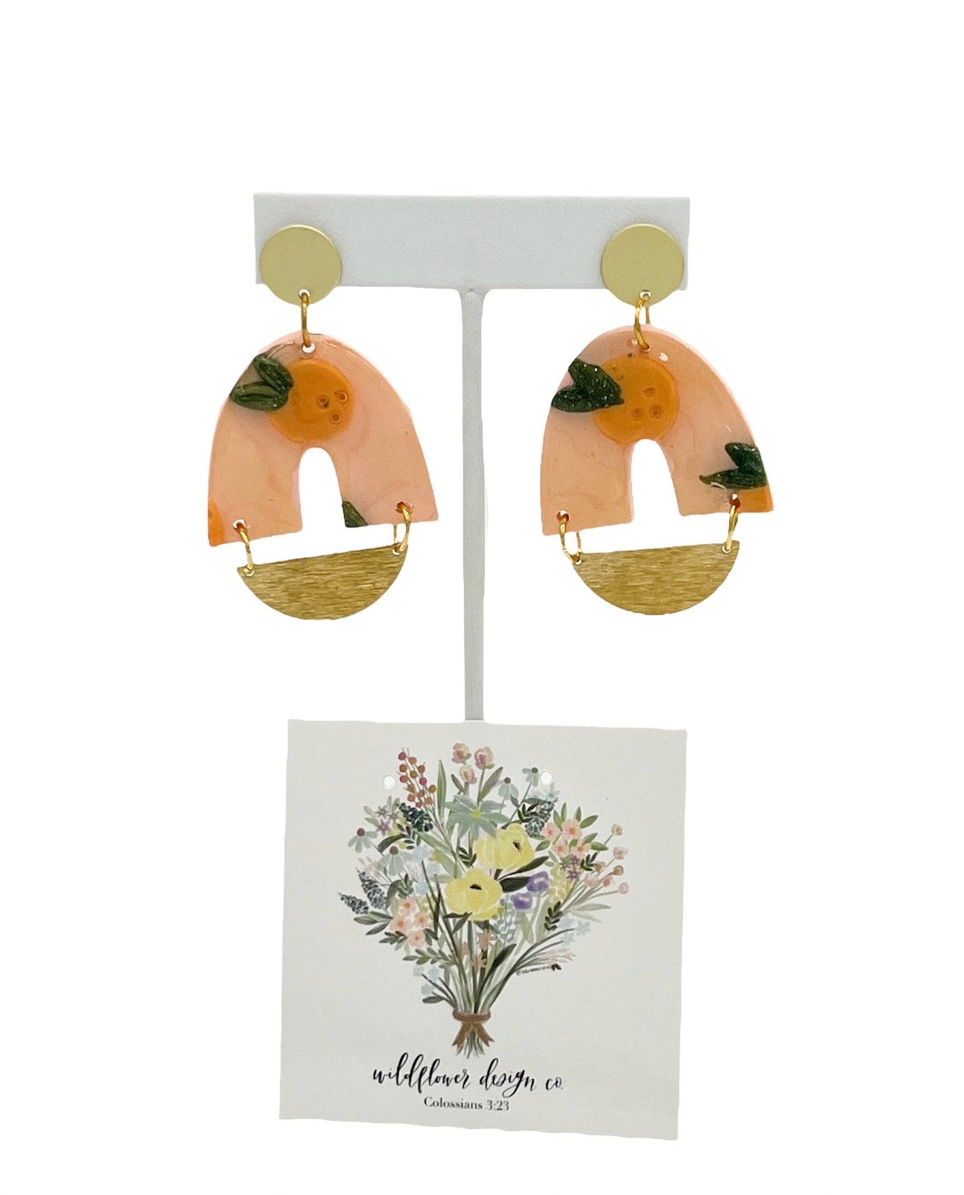 Handcrafted peach earrings with gold accents