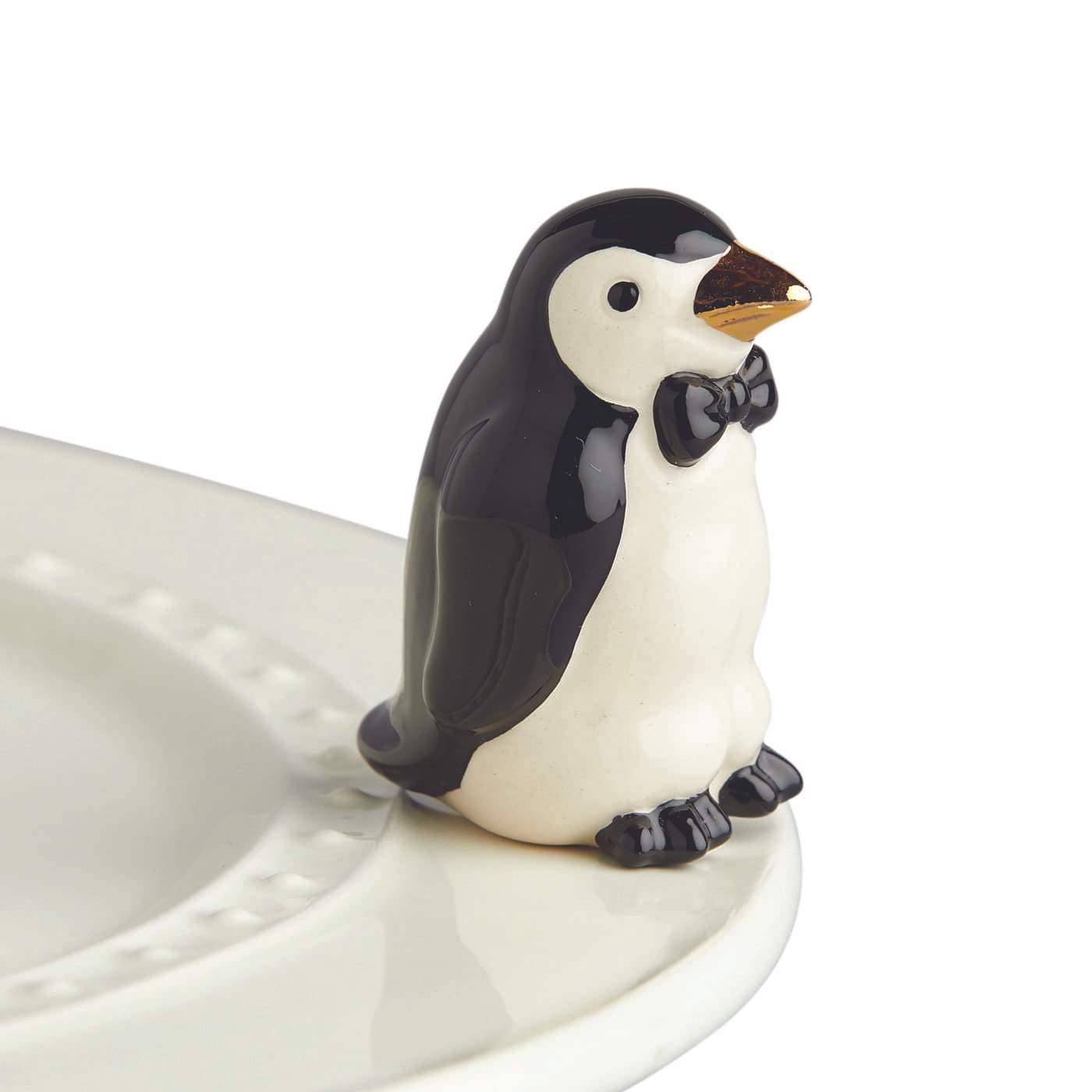 Black and white penguin with a gold beak and black bow tie mini for a Nora Fleming dish