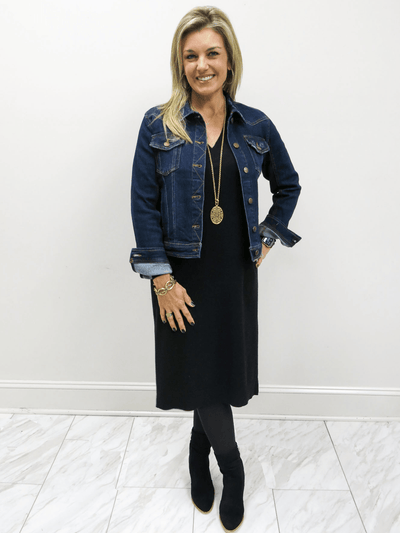 Risen classic women's jean jacket paired with a Charlie Paige black sweater dress.