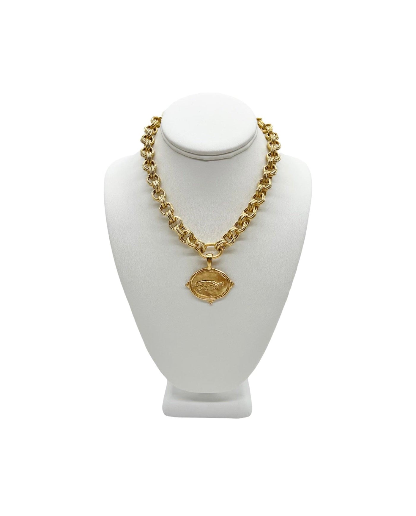 large double chain linked necklace with large three studded drop pendant with a detailed tiger on a white neck display