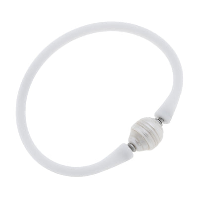 White silicone bracelet with a small pearl bead